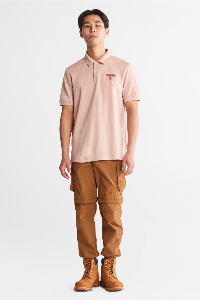 חולצת פולו עם הדפס T בצד שמאל