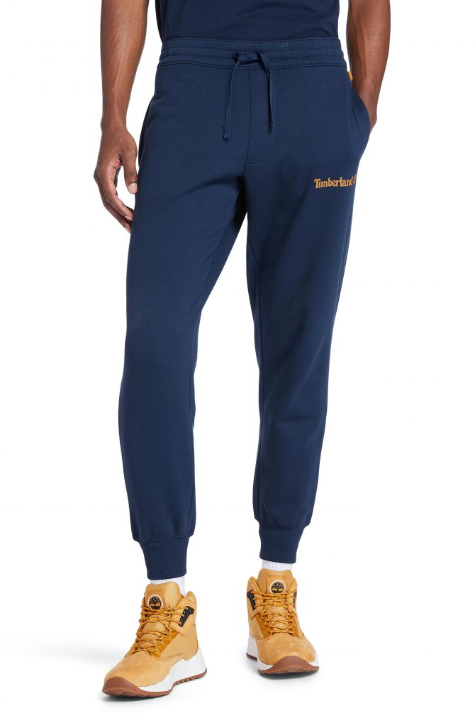 מכנסי טרנינג עם הדפס לוגו