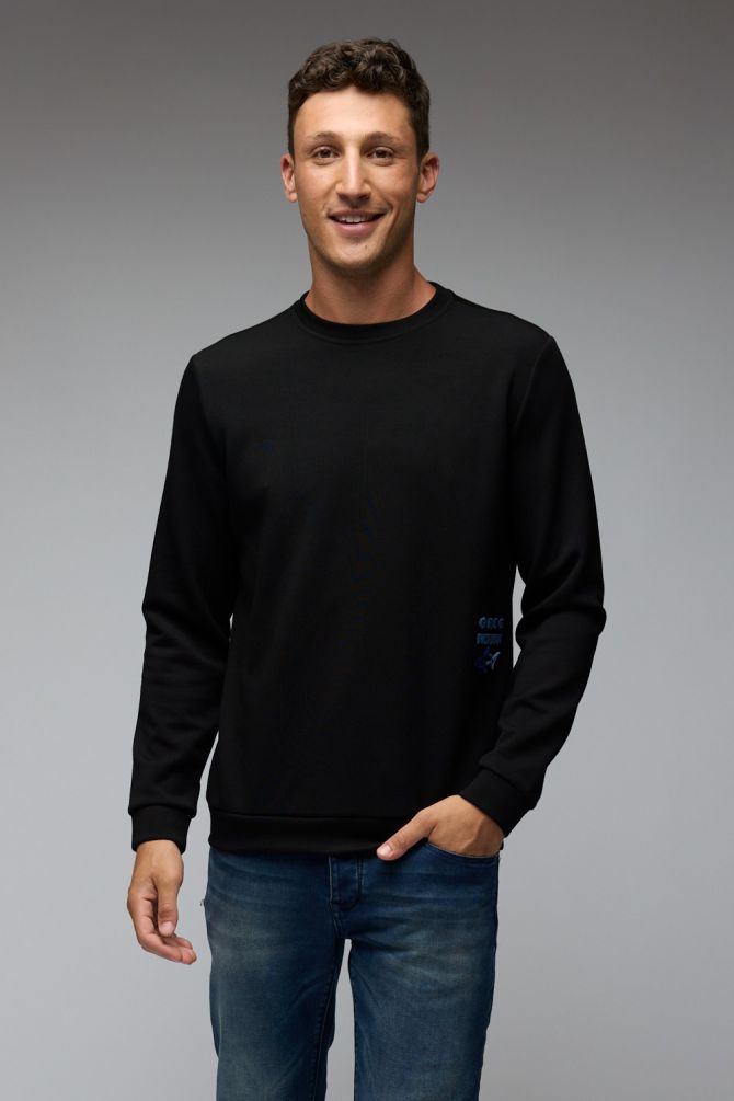 סוויטשירט גרג נורמן