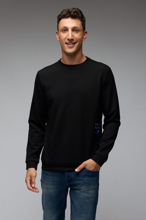 סוויטשירט גרג נורמן